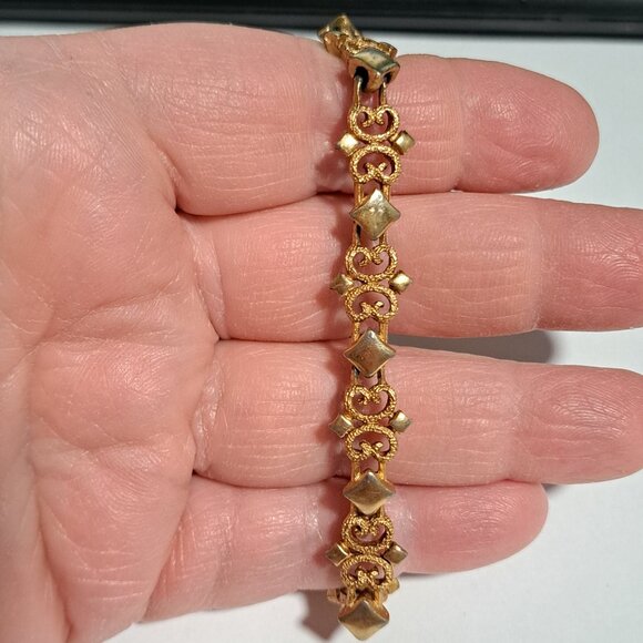 Avon Jewelry - Avon gold tone bracelet with intricate designs